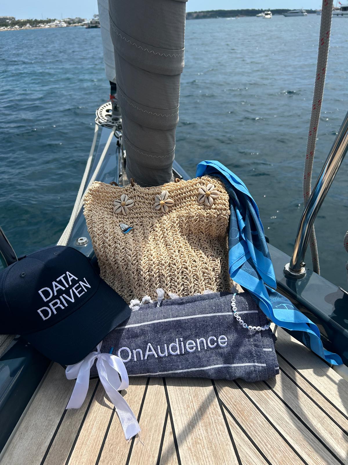 Data Driven cap & OnAudience merch on deck