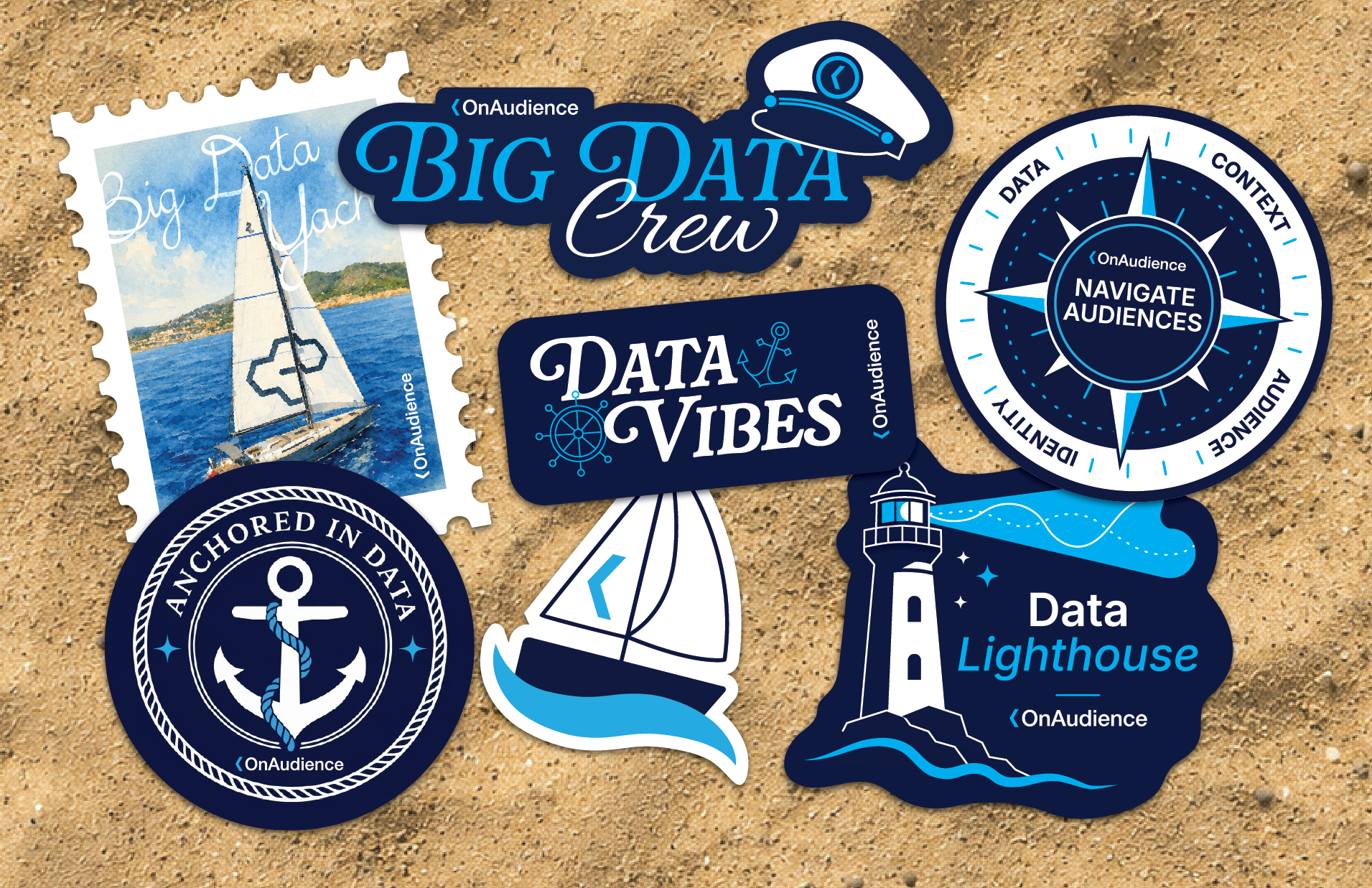 OnAudience sticker set on sand — Big Data Crew, Data Vibes, Navigate Audiences, Anchored in Data, Data Lighthouse